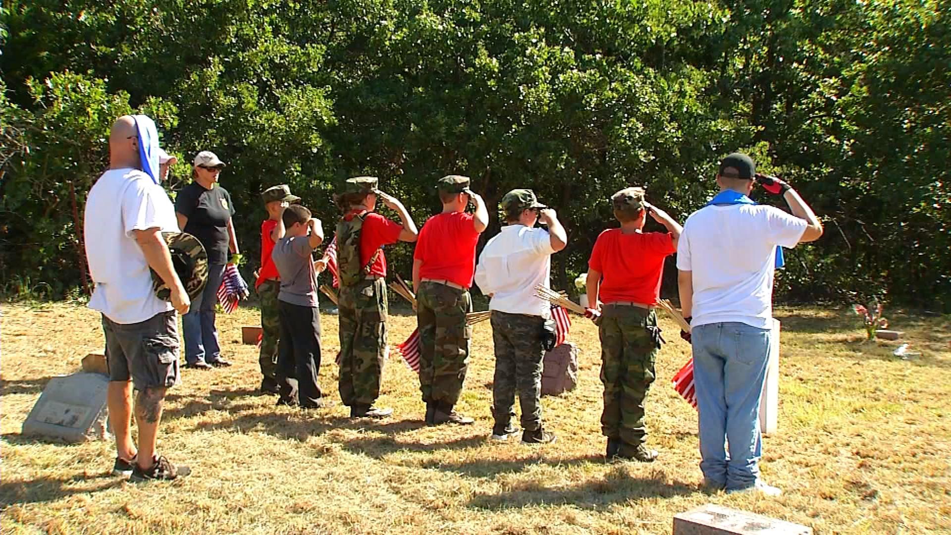 Volunteers Gather To Clean, Desegregate Veteran Cemetery