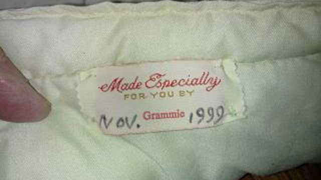 The tag says made by "Grammie" on it and it looks like it has been passed down through years.