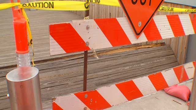 Treated glulam is a greenish/gray color, and on the SkyDance Bridge, there are hints of it, but the wood must be preserved and treated properly or any warranty would be void and so would the integrity.