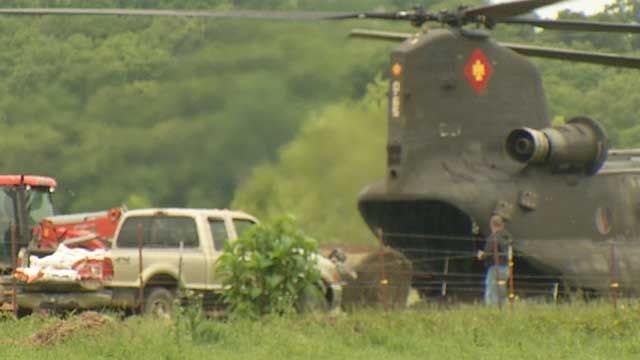 National Guard Helicopters Help Cattle Stranded By Flood Waters