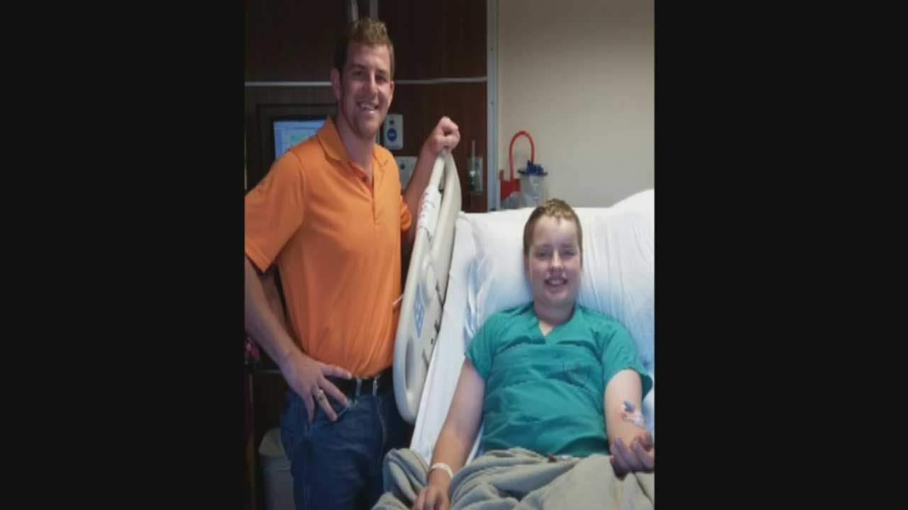 Hero In Orange Helps Young OSU Parade Victims